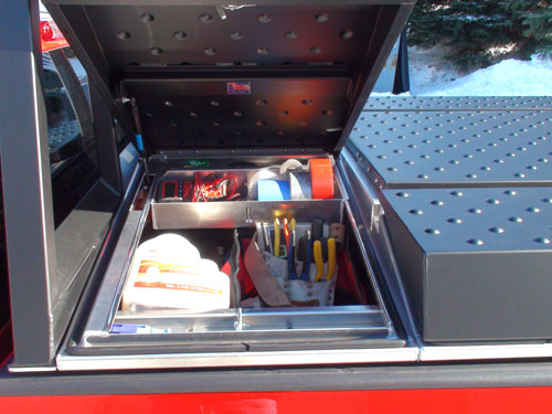 Mechanics body on a pickup truck by Highway Products.