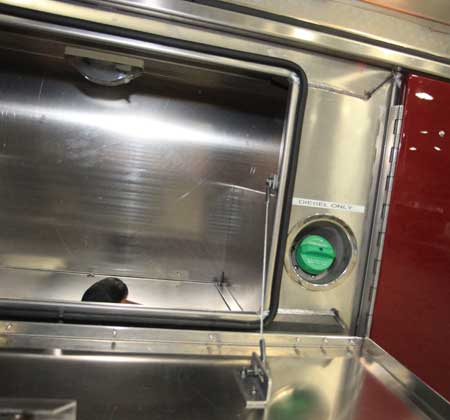 This picture shows the fuel filler cap is located behind the door which gives you added security from theft or vandalism. See at Highway Prodcucts webiste.