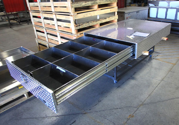Truck bed tool boxes with drawers