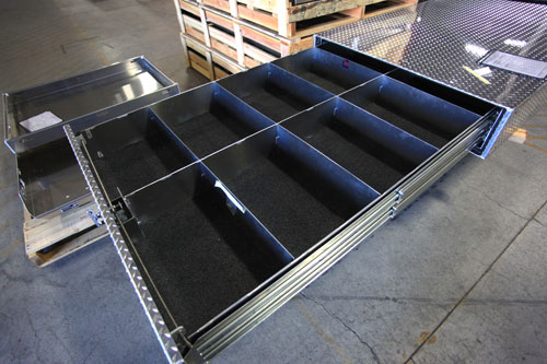 Truck bed tool boxes with drawers