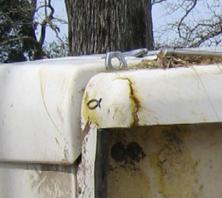 Vet Box made of fiberglass shown cracking.